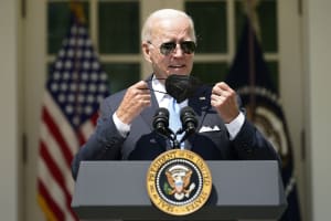 Biden emerges from COVID isolation, tells public: Get shots