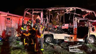 Fire guts RV, SUV at Pine Manor home