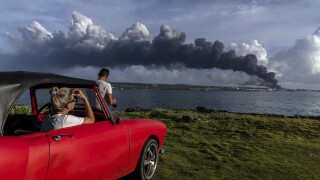 Firefighters battle big blaze at Cuba tank farm for 2nd day