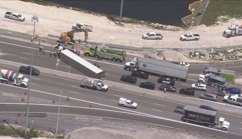 Tractor-trailer rollover shuts down NB lanes of Turnpike in northwest Miami-Dade