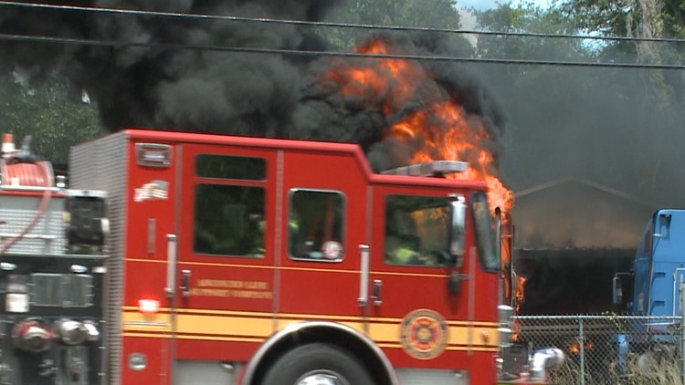 Truck, storefront catch fire in Jacksonville