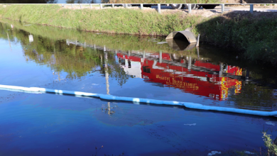 One person hospitalized after dump truck falls into canal in Loxahatchee