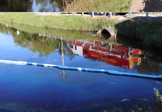 One person hospitalized after dump truck falls into canal in Loxahatchee