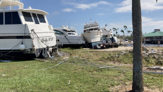 Officials in Fort Myers say they can’t just remove boats from downtown marina