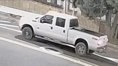 Pickup truck driver captured discharging a gun in Murray Hill on surveillance camera